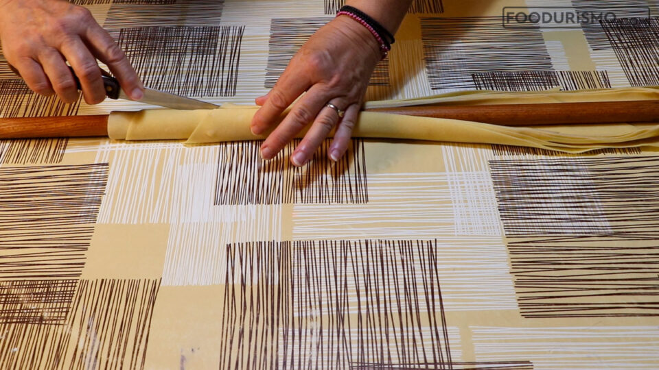 cutting the sheet on the rolling pin