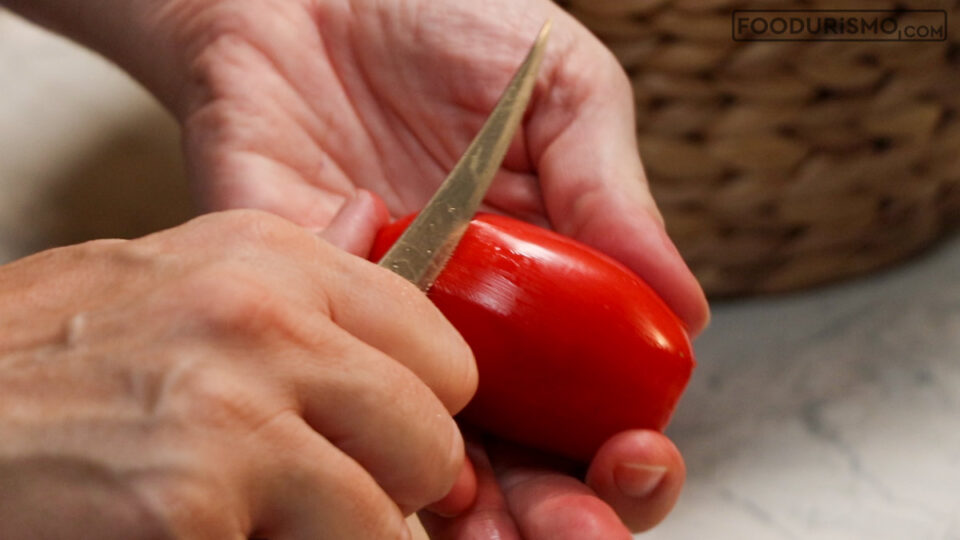 scoring tomatoes for peeling